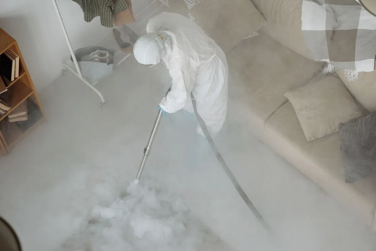 Biohazard cleanup technician in protective equipment, Bridgetown, OH